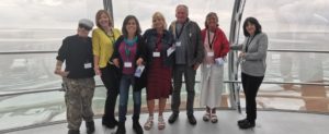 Trust beneficiaries and staff in a glass pod on the Brighton i360 observation tower during a beneficiary local event